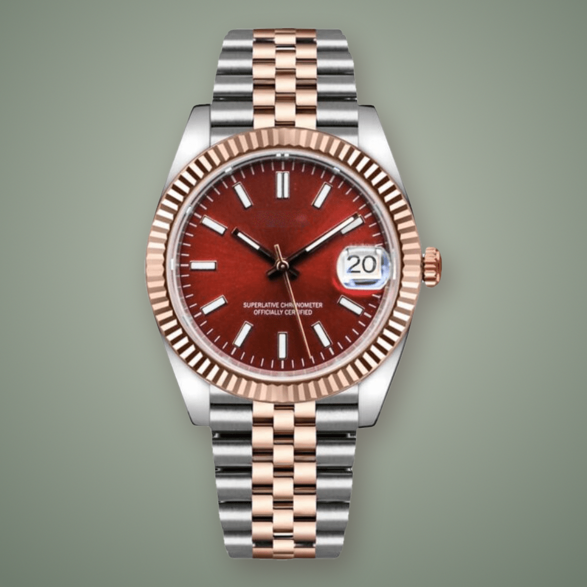 Crownline Date Two-Tone Burgundy Red, front view with burgundy-red dial, rose-gold fluted bezel, and two-tone steel bracelet on a sage studio background.