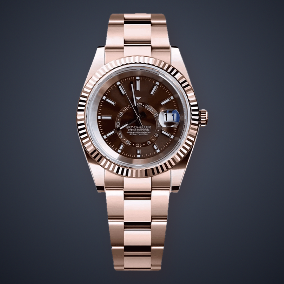 Celestial Calendar Rose Gold and Champagne watch, front view with champagne-brown dial and rose-gold three-link bracelet on a slate studio background.