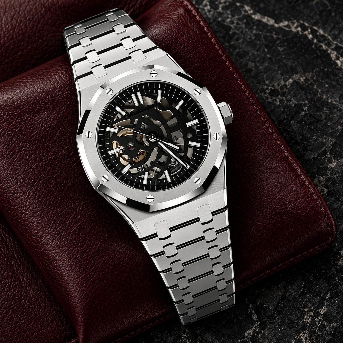 Royal Sportline Skeleton watch laid diagonally on burgundy leather and dark graphite stone