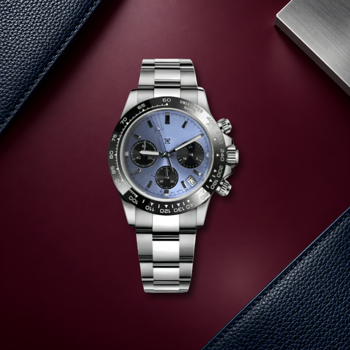 Speedline Glacier Racer chronograph laid flat on plum lacquer with navy leather