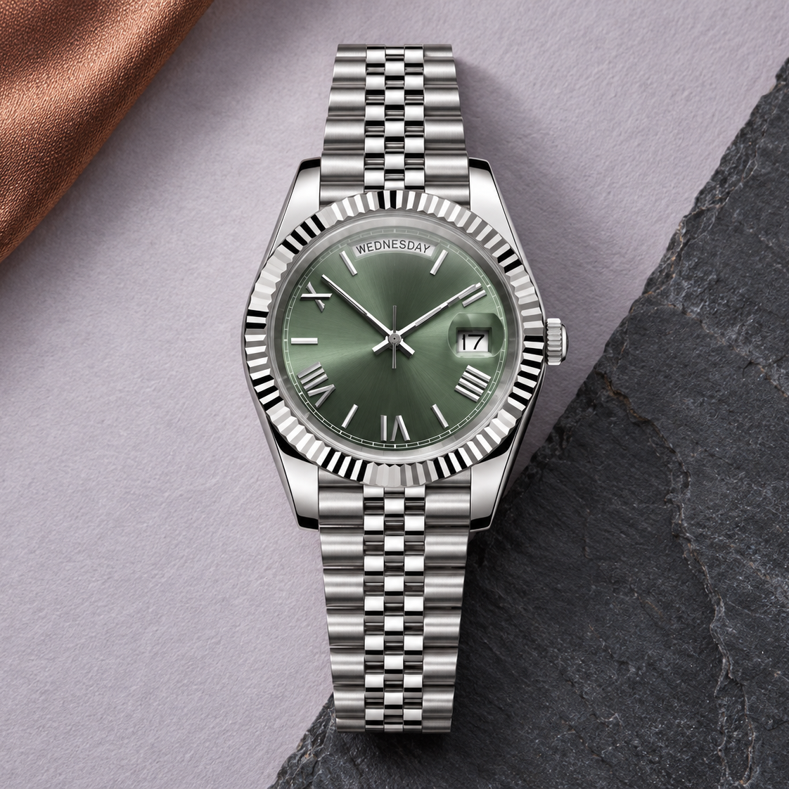Dayline Mint Green watch with Jubilee bracelet on lilac slate