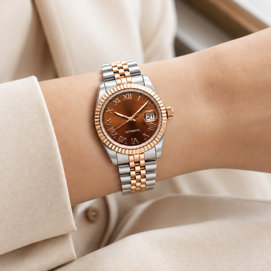 Lady Crownline bronze Roman watch with date 21 on wrist and ivory sleeve