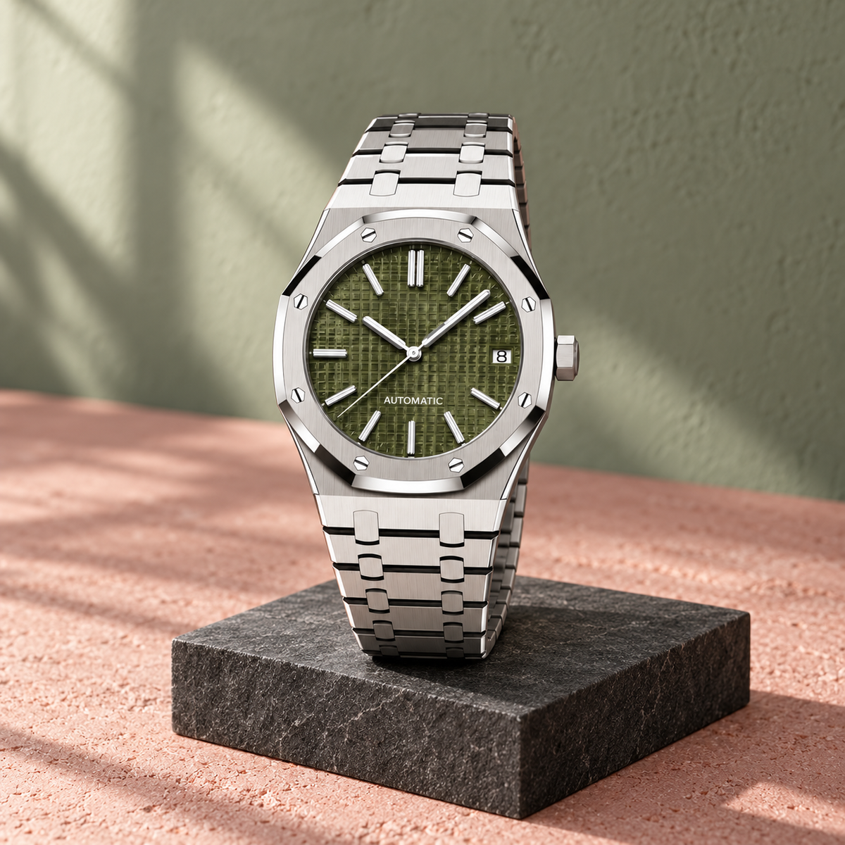 Royal Sportline Olive watch displayed on a charcoal stone stand