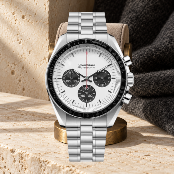 Speedline Chronograph Apollo on a brass watch stand with limestone and charcoal wool