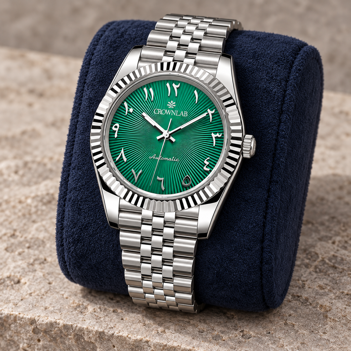 Arabic Heritage Edition Emerald Sunray Steel Bracelet on navy suede cushion
