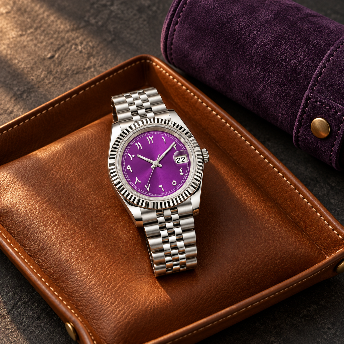Royal purple 36mm watch on cognac leather valet pad with violet suede roll