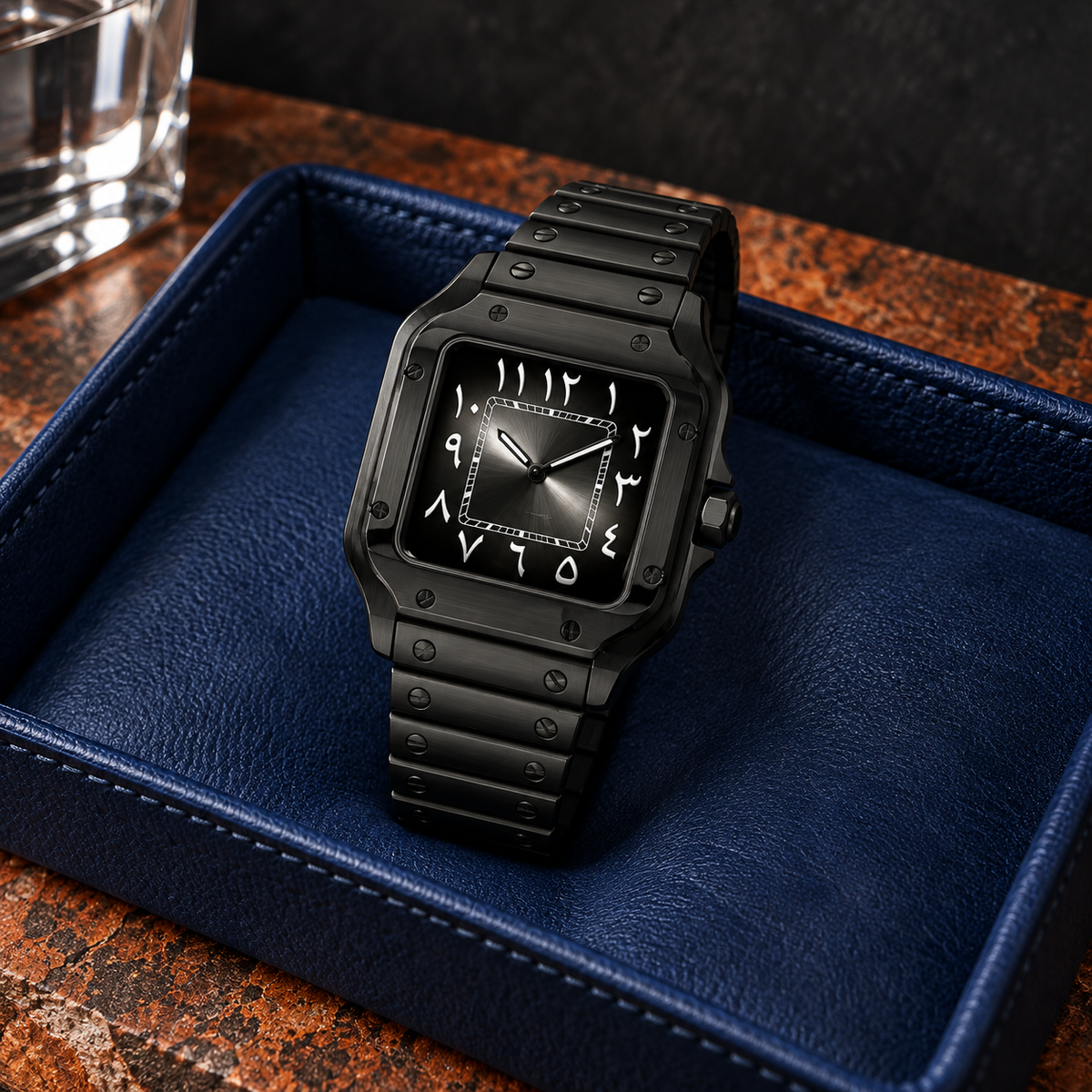 Black square watch on cashmere over walnut with matte black cushion