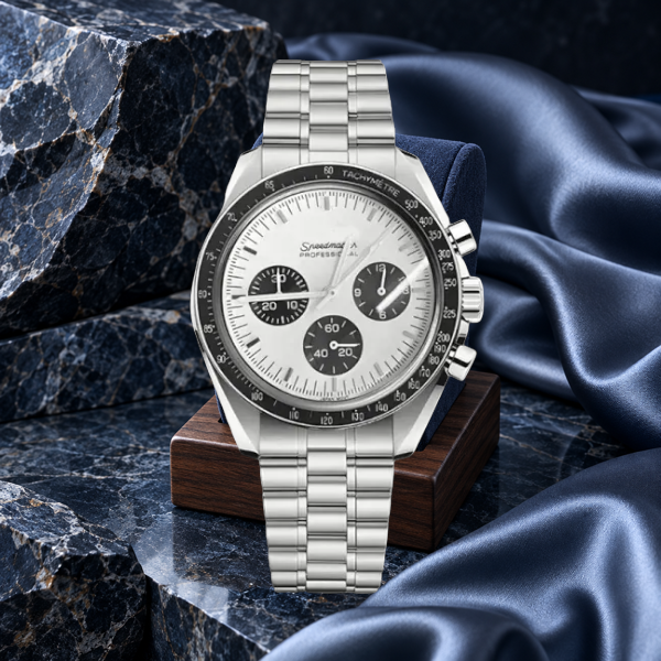 Speedline Chronograph Celestial Blue on an indigo suede walnut watch support with blue-gray stone