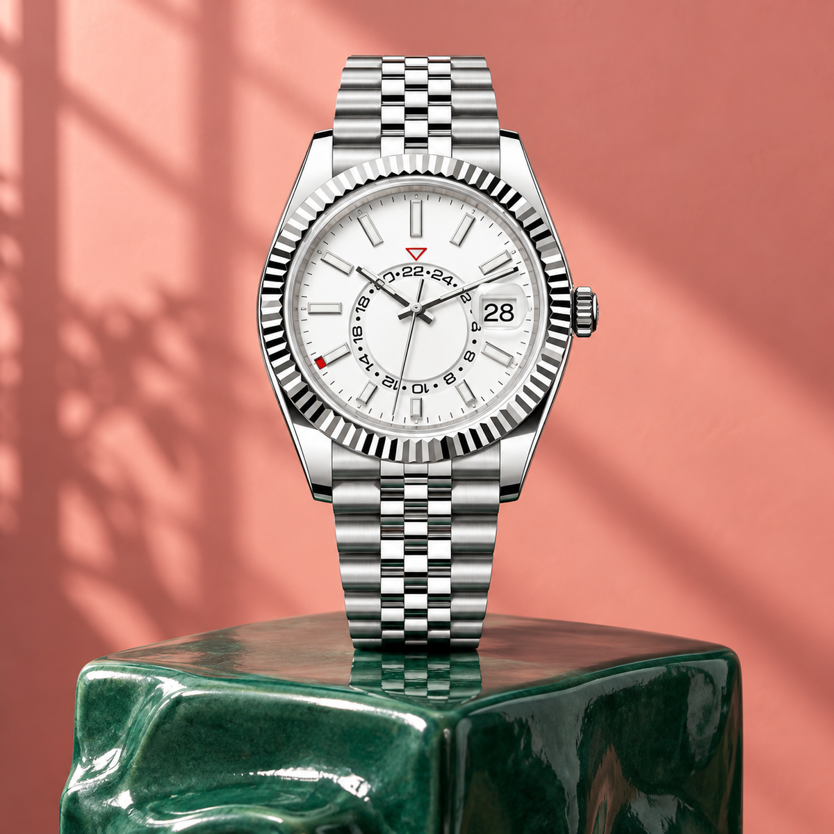 Ghost-white Celestial Calendar automatic watch on an emerald-glazed display block
