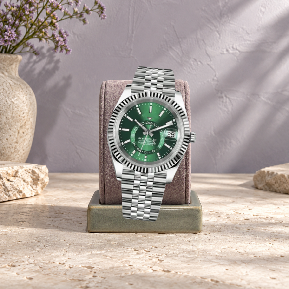 Celestial Calendar Crystal Green on mauve suede and sage ceramic against pale stone