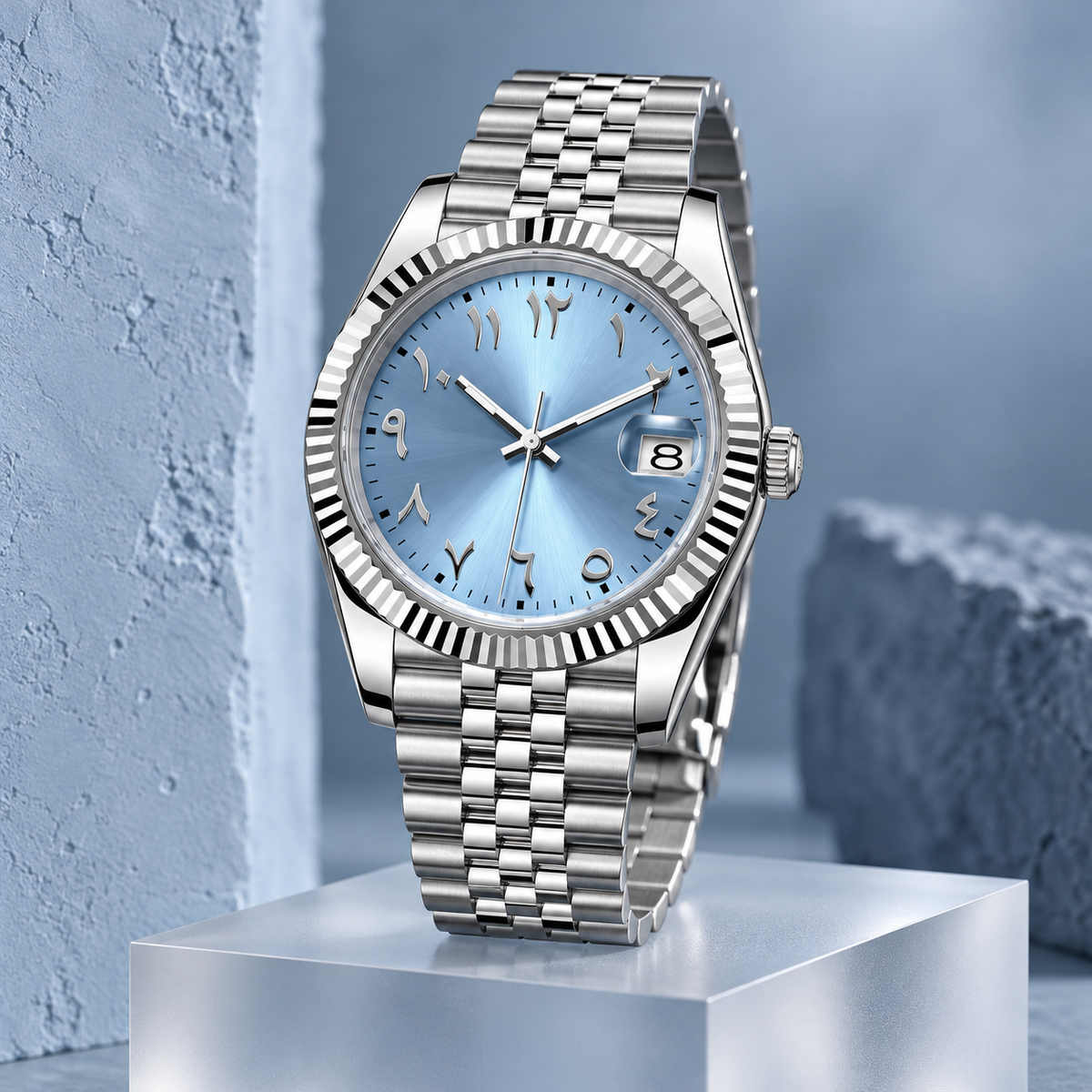 Ice-blue Arabic numeral date watch with Jubilee bracelet on frosted glass display stand