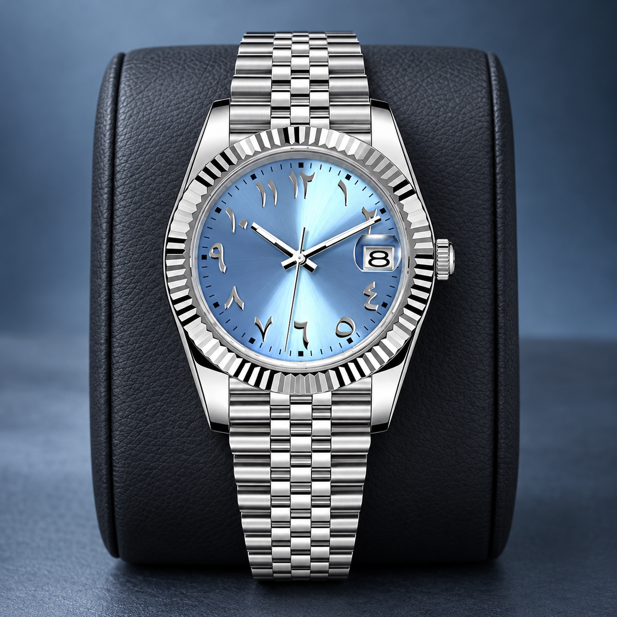Ice-blue Arabic numeral Crownline automatic date watch with Jubilee bracelet on charcoal leather cushion