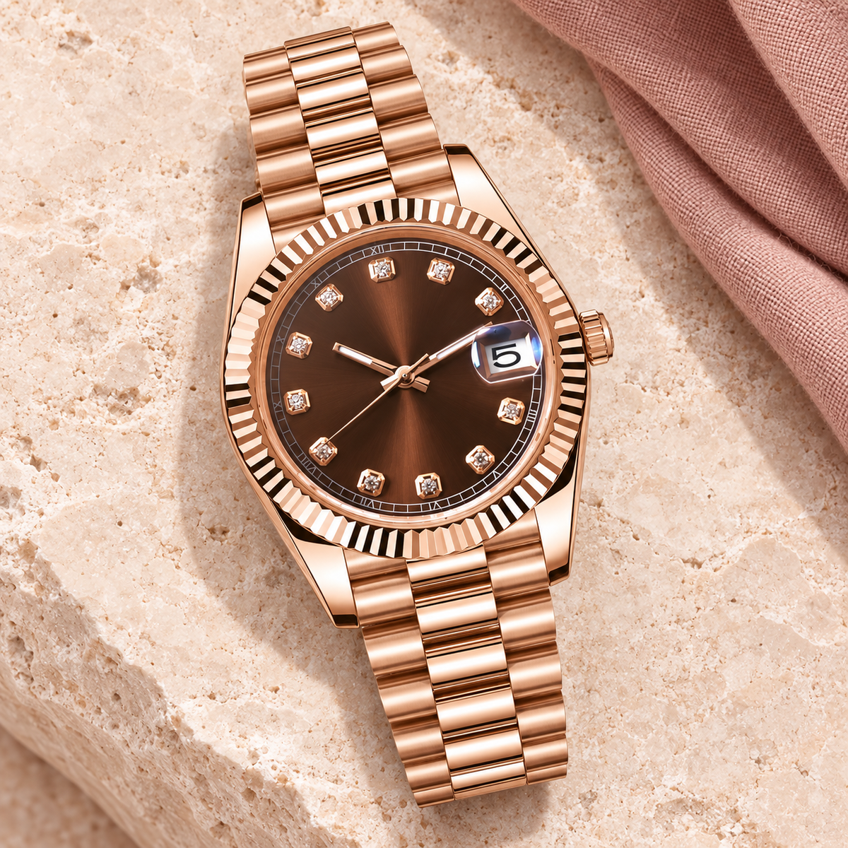 Crownline Date Chocolate brown-dial automatic watch on Five-Links bracelet, laid on blush limestone