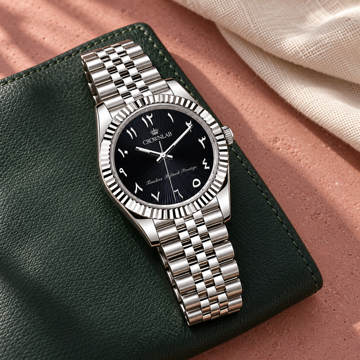 Arabic Heritage Midnight Sunray watch on forest-green leather beside rose ceramic