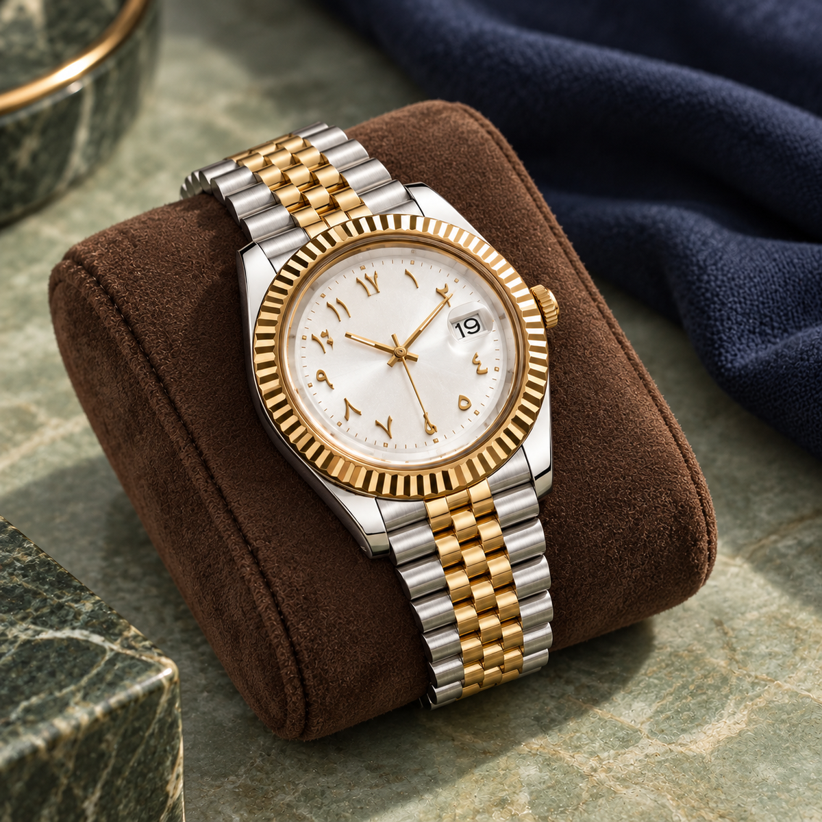 Arabic Heritage frost-white two-tone watch on walnut suede over sage stone
