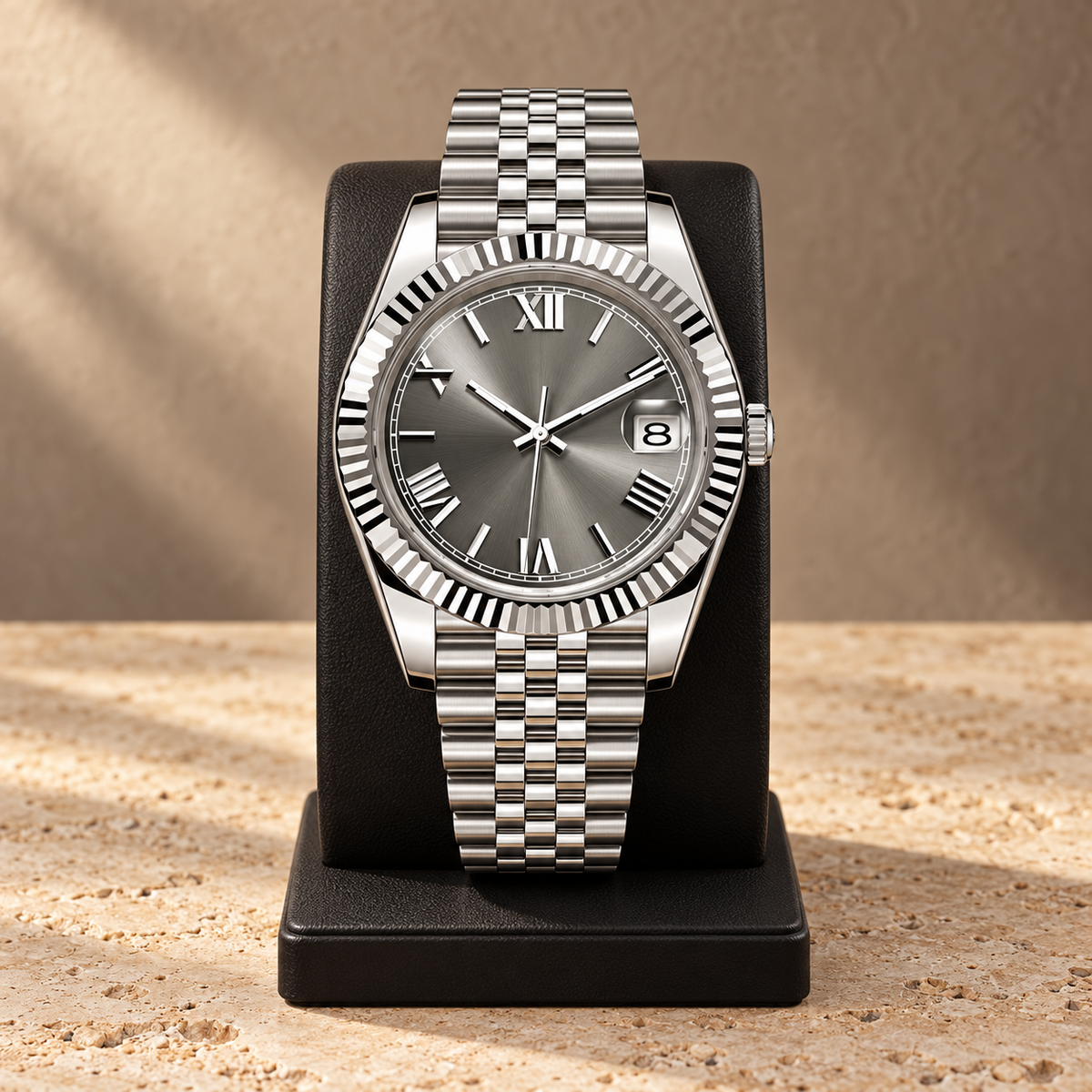 Crown Numeral Silver watch on dark stand and taupe limestone