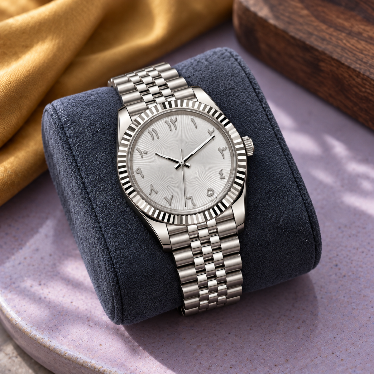 Arabic Heritage silver sunray watch on charcoal-blue suede over lavender ceramic