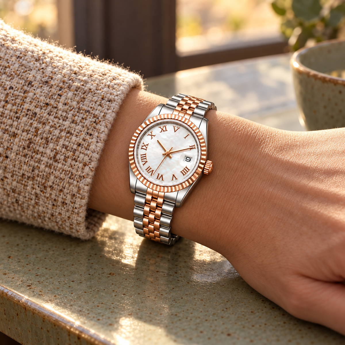 Rose Gold Roman Pearl Dial watch worn with oatmeal tweed cuff