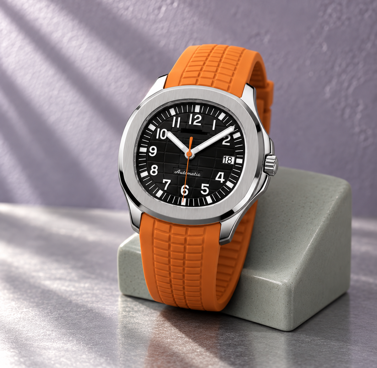 Nautiko Black & Orange watch on pale sage ceramic with lavender-gray background