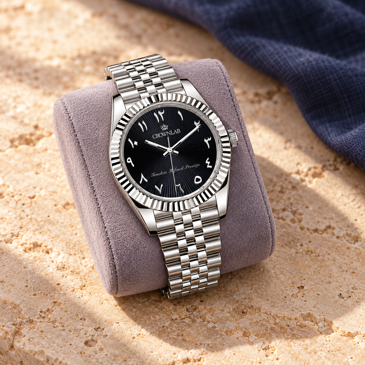 Arabic Heritage Midnight Sunray watch on a lavender cushion over apricot limestone
