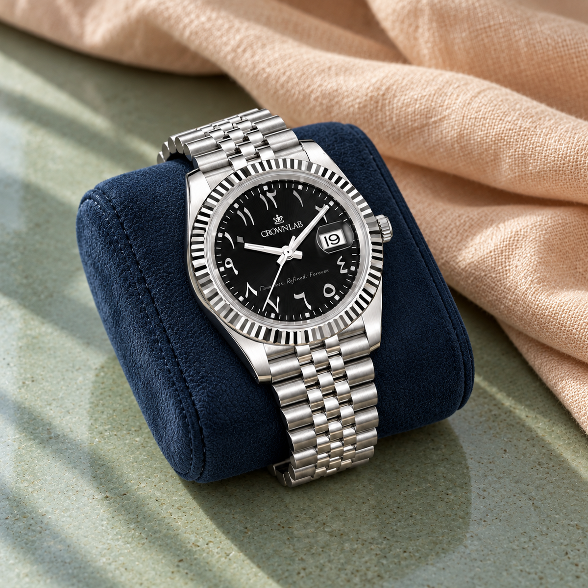 Arabic Heritage Onyx Black & Steel on midnight suede against sage ceramic