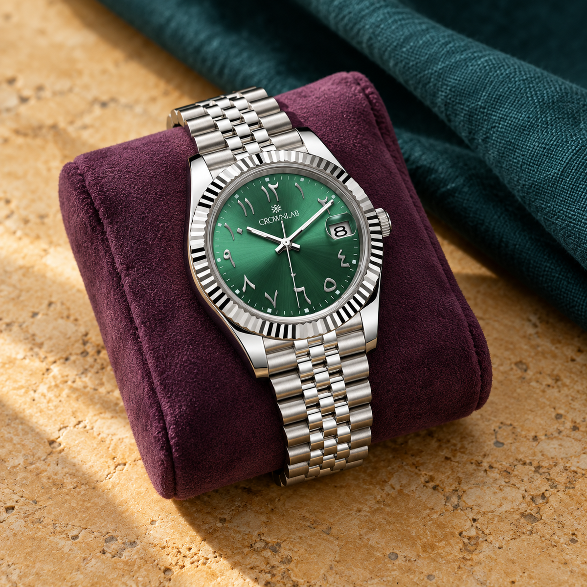 Arabic Heritage emerald green watch on plum suede with ochre stone and teal linen