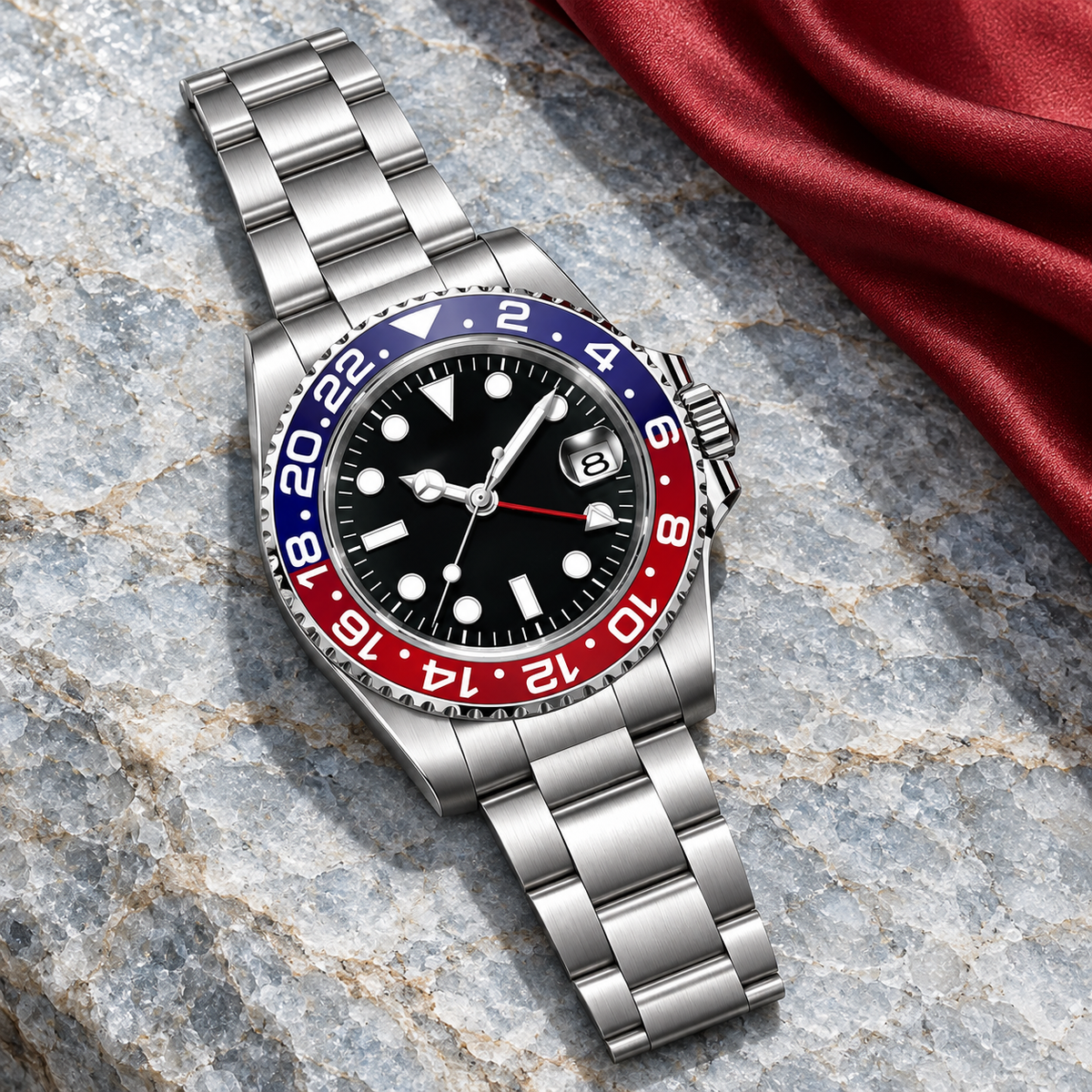 GMT Navigator Blue & Red with Three-Link steel bracelet laid on pale blue-grey quartzite and red silk
