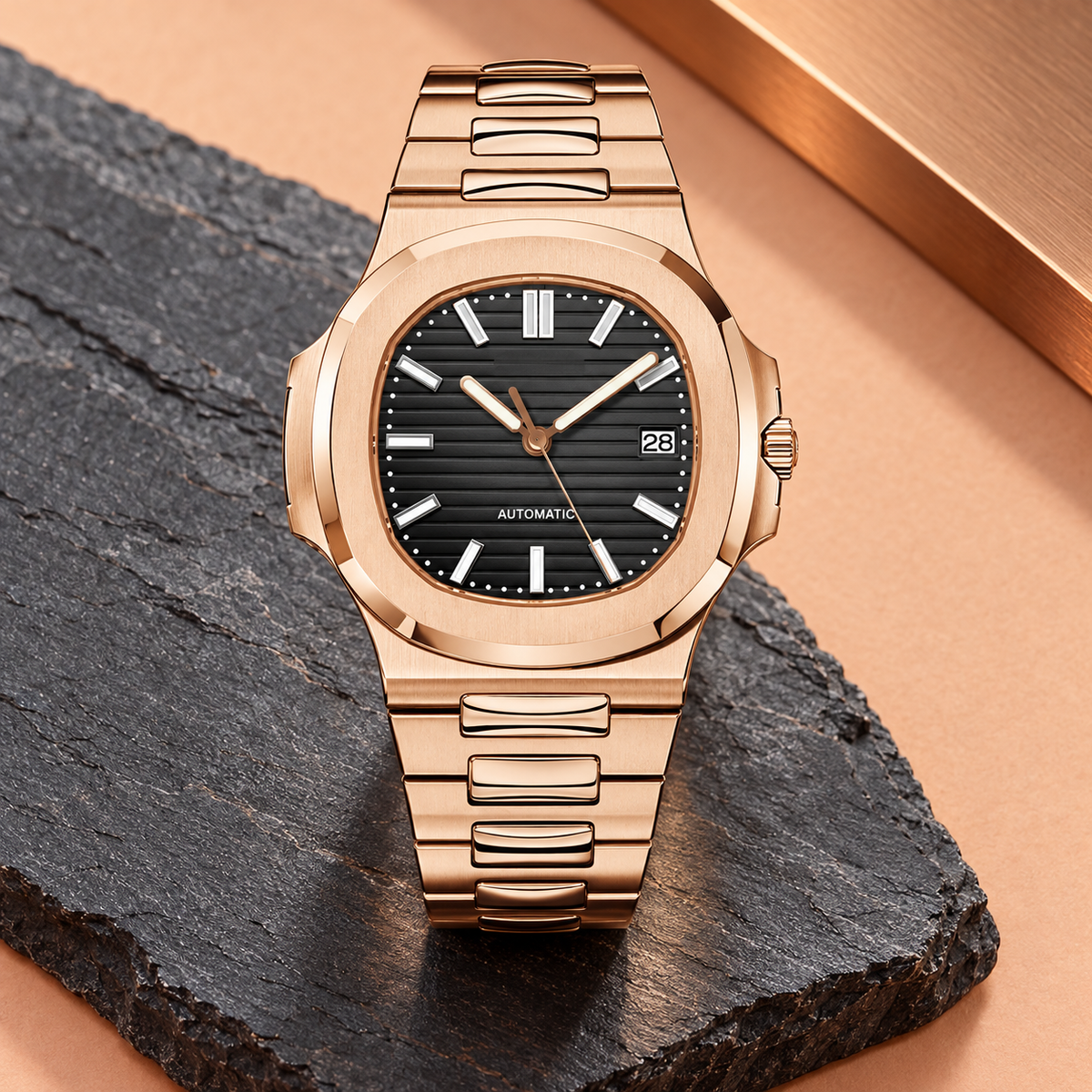 Nautiko Rose Gold and Stealth Black watch supported on dark slate over apricot