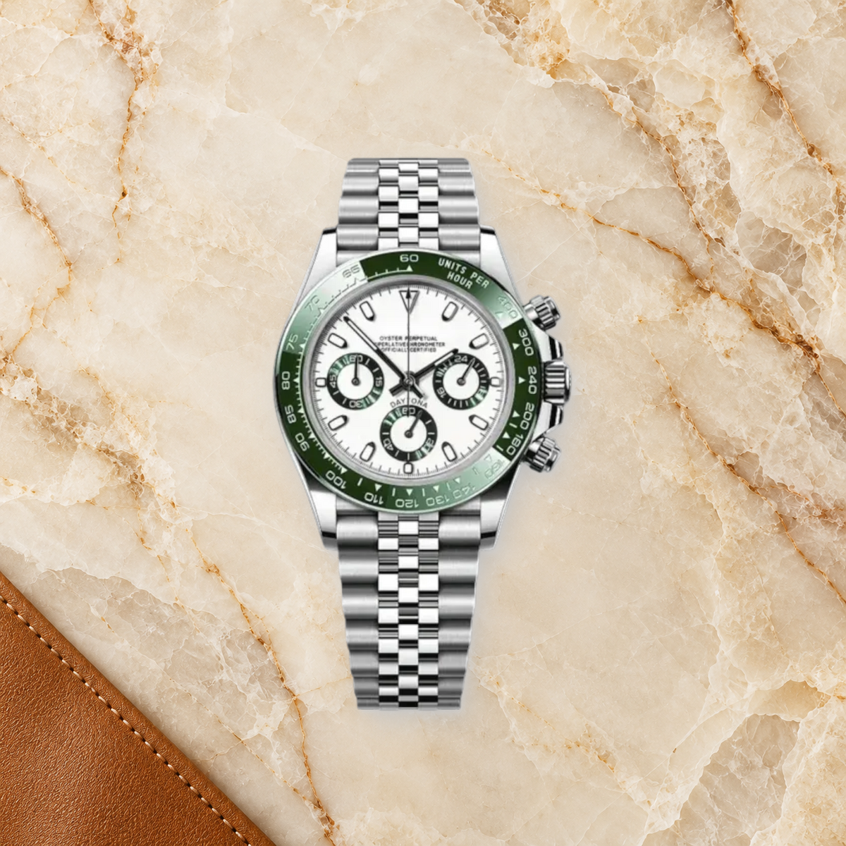 Speedline Alpine Green Racer chronograph lying face-up on ivory calcite beside cognac leather
