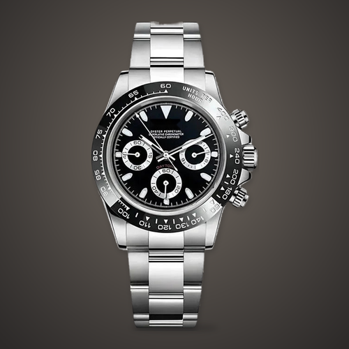 Front view of the Speedline Chronograph – Stealth Black with black dial, three contrasting subdials, black tachymeter bezel and stainless-steel bracelet on a warm stone-toned studio background.