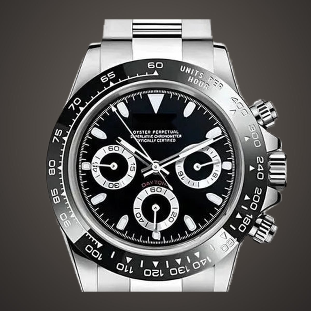 Close-up of the Speedline Chronograph – Stealth Black dial, three chronograph subdials and black tachymeter bezel on a warm stone-toned studio background.